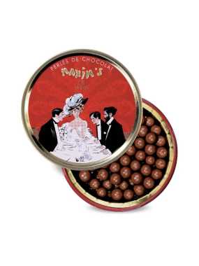 Round tin with milk chocolate pearls 50 g Maxim’s